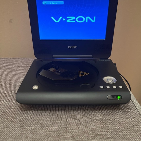 Coby V-zon portable DVD. Like new in great condition 
7” - Picture 2 of 5